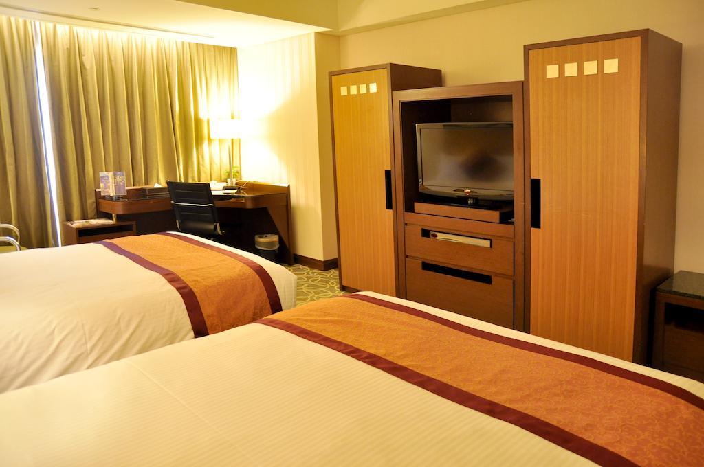 Evergreen Plaza Hotel - Tainan Habitación foto Deluxe room